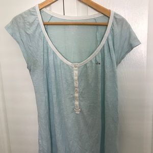 Women’s Lacoste v-neck shirt, size 8 light blue